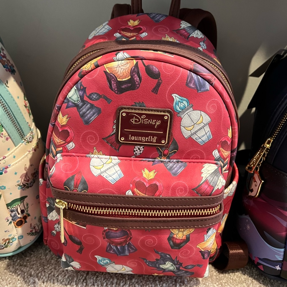 EUC  Disney villains perfume bottles Loungefly mini backpack